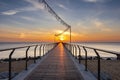 Bridge on the beach at sunrise